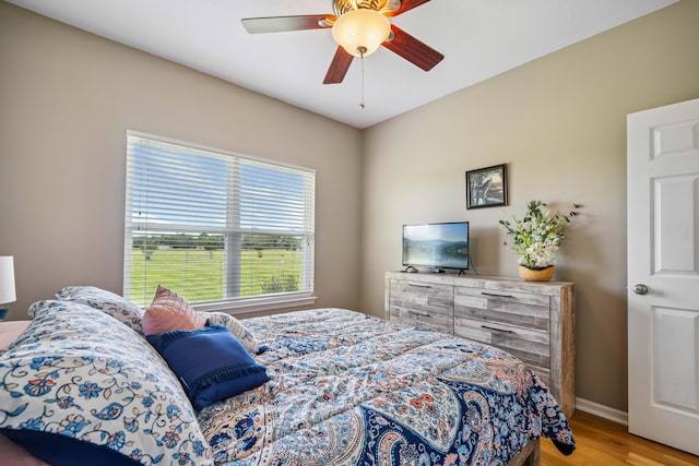 4820 Griffith Rd, Holt, FL 32564 - bedroom with light wood-style flooring and ceiling fan