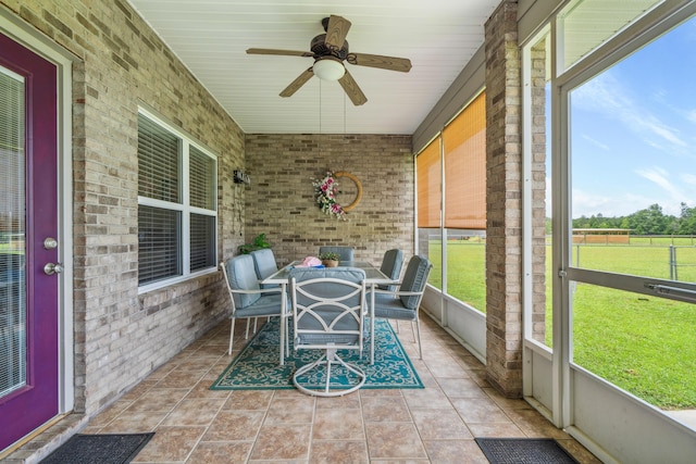 4820 Griffith Rd, Holt, FL 32564 - sunroom with a ceiling fan and outdoor dining area