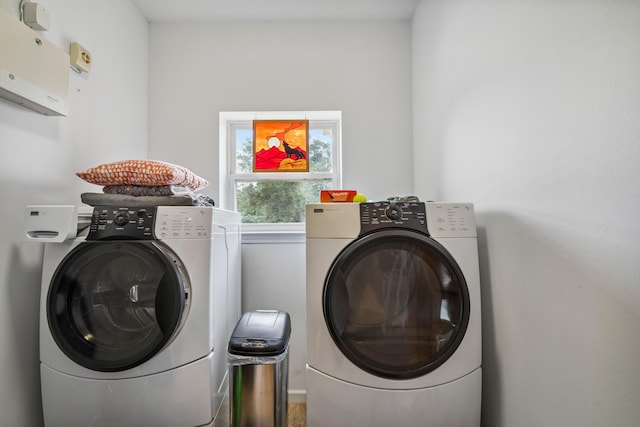 4820 Griffith Rd, Holt, FL 32564 - washroom with washer and dryer and a wall mounted AC