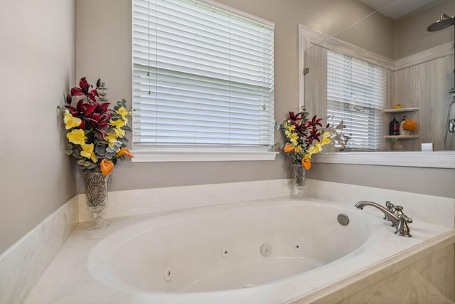 4820 Griffith Rd, Holt, FL 32564 - full bath featuring a tub with jets and healthy amount of natural light