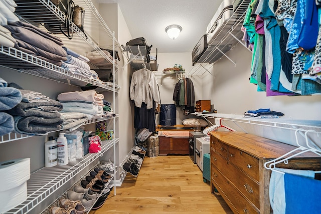 4820 Griffith Rd, Holt, FL 32564 - walk in closet featuring wood finished floors