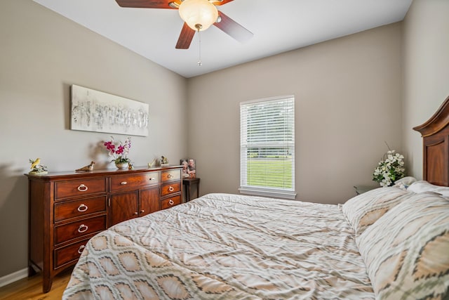 4820 Griffith Rd, Holt, FL 32564 - bedroom featuring light wood-style flooring and a ceiling fan