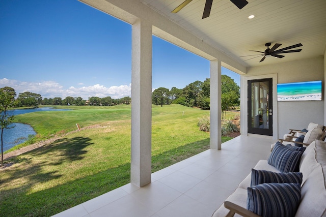 1831 Tuscana Pl, Miramar Beach, FL 32550 - view of patio / terrace with ceiling fan and a water view