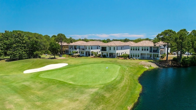 1831 Tuscana Pl, Miramar Beach, FL 32550 - view of community with golf course view, a water view, and a lawn