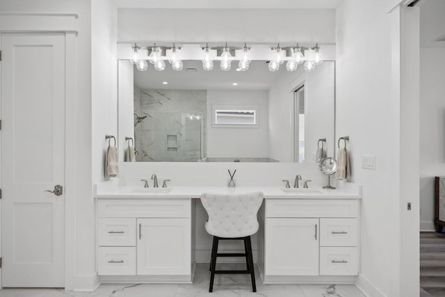1831 Tuscana Pl, Miramar Beach, FL 32550 - full bathroom with marble look tile flooring, a marble finish shower, and double vanity