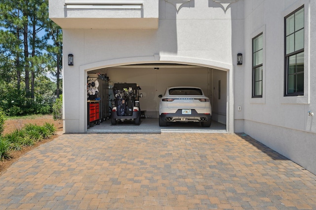 1831 Tuscana Pl, Miramar Beach, FL 32550 - garage featuring driveway