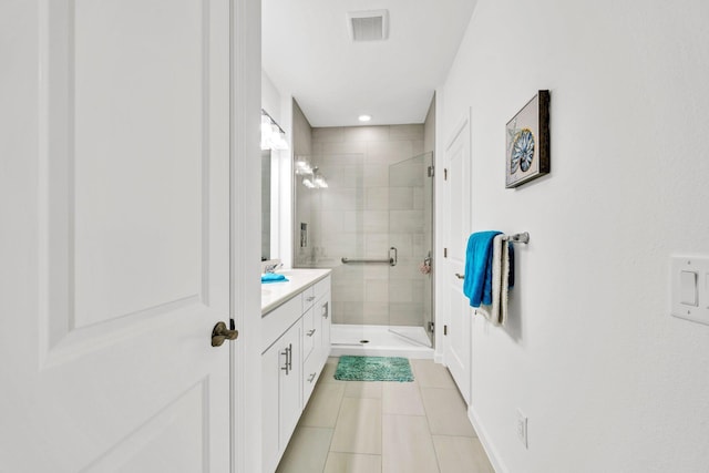 8546 Dreams Float Ct, Panama City Beach, FL 32413 - full bathroom featuring a shower stall, vanity, and tile patterned floors