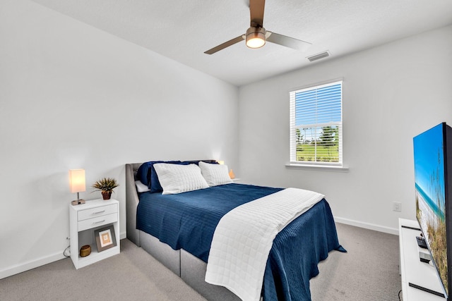 8546 Dreams Float Ct, Panama City Beach, FL 32413 - carpeted bedroom with baseboards and ceiling fan