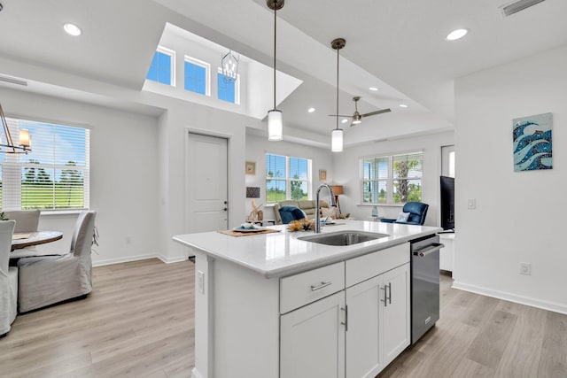 8546 Dreams Float Ct, Panama City Beach, FL 32413 - kitchen featuring open floor plan, dishwasher, a chandelier, light wood finished floors, and recessed lighting