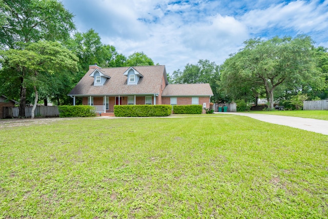 2786 Willow Bend Ct, Crestview, FL 32539 - cape cod home featuring covered porch and brick siding