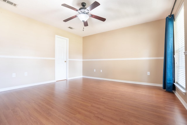 2786 Willow Bend Ct, Crestview, FL 32539 - unfurnished room with a ceiling fan and wood finished floors