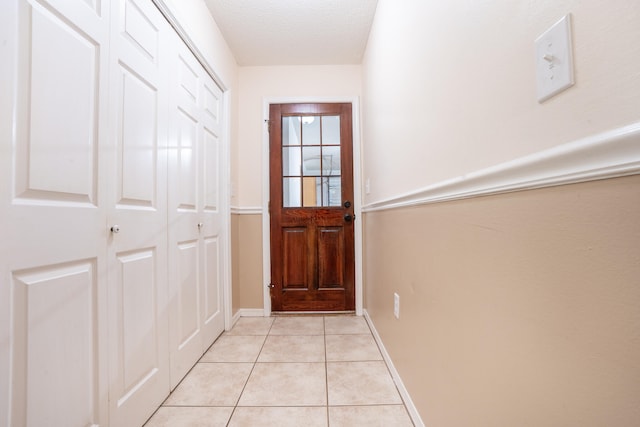 2786 Willow Bend Ct, Crestview, FL 32539 - entryway with light tile patterned floors and a textured ceiling