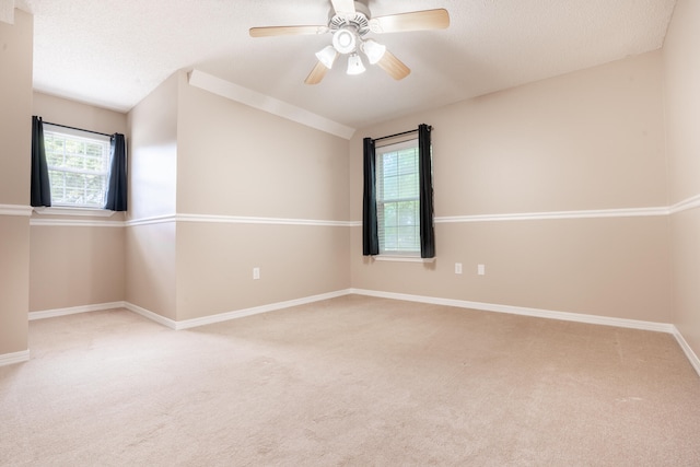 2786 Willow Bend Ct, Crestview, FL 32539 - unfurnished room featuring carpet, a ceiling fan, vaulted ceiling, and a textured ceiling