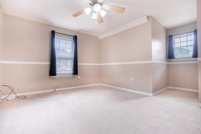 2786 Willow Bend Ct, Crestview, FL 32539 - spare room featuring carpet flooring, vaulted ceiling, and a ceiling fan