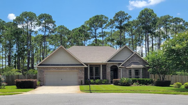 114 S Knightsbridge Ct, Santa Rosa Beach, FL 32459 - view of front of home featuring brick siding, driveway, an attached garage, and a shingled roof