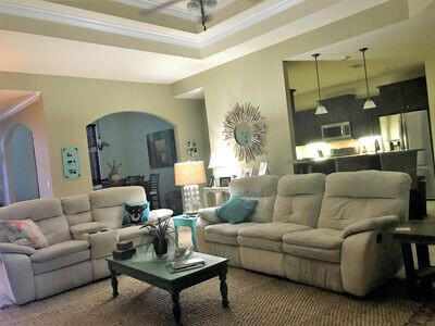 114 S Knightsbridge Ct, Santa Rosa Beach, FL 32459 - living area featuring arched walkways and ornamental molding