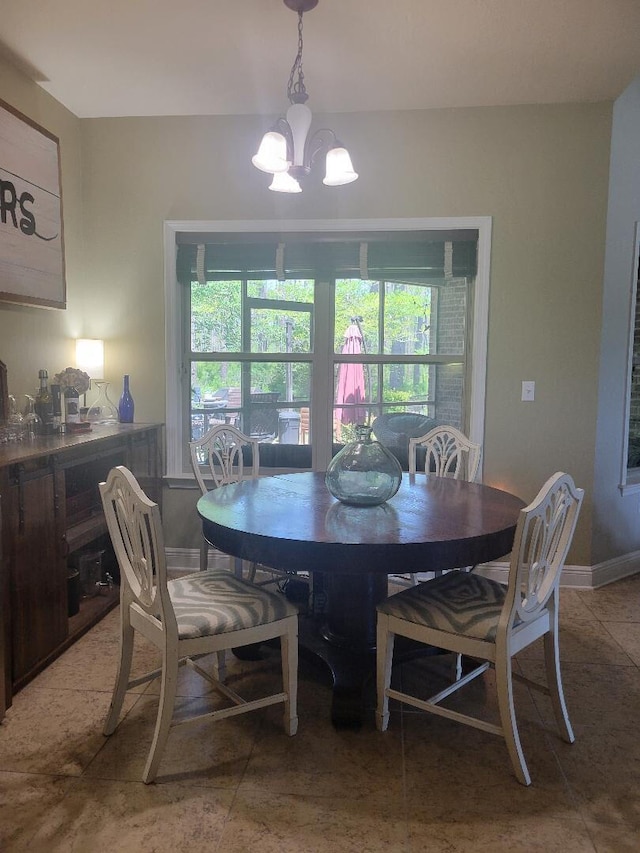 114 S Knightsbridge Ct, Santa Rosa Beach, FL 32459 - dining room featuring a chandelier and tile patterned floors