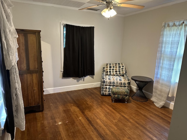 308 S Depot St, Bonifay, FL 32425 - sitting room with wood finished floors, ceiling fan, and crown molding