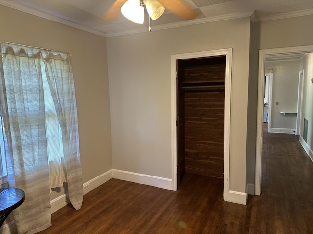 308 S Depot St, Bonifay, FL 32425 - unfurnished bedroom with dark wood-style flooring and ornamental molding