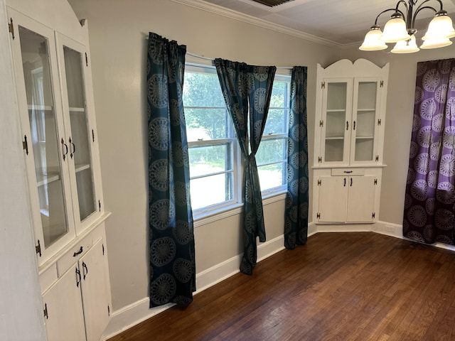 308 S Depot St, Bonifay, FL 32425 - entrance foyer featuring a chandelier, ornamental molding, and dark wood-type flooring