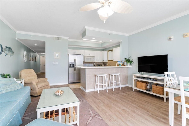 1515 SE Miracle Strip Pkwy Unit 305, Fort Walton Beach, FL 32548 - living room featuring crown molding, light wood-type flooring, ceiling fan, and recessed lighting