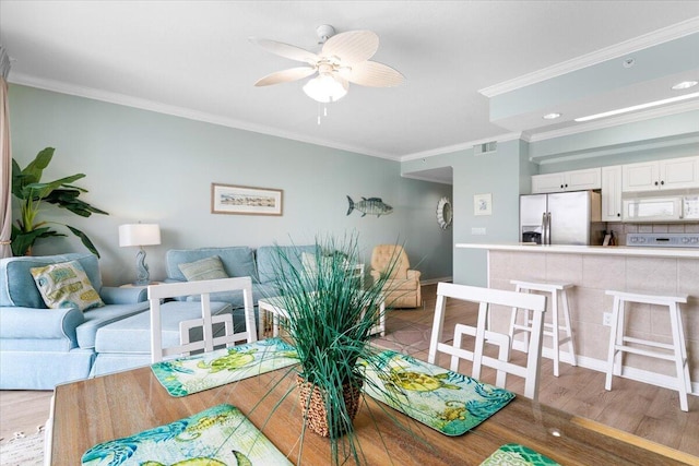 1515 SE Miracle Strip Pkwy Unit 305, Fort Walton Beach, FL 32548 - living room with crown molding, light wood-style floors, ceiling fan, and recessed lighting