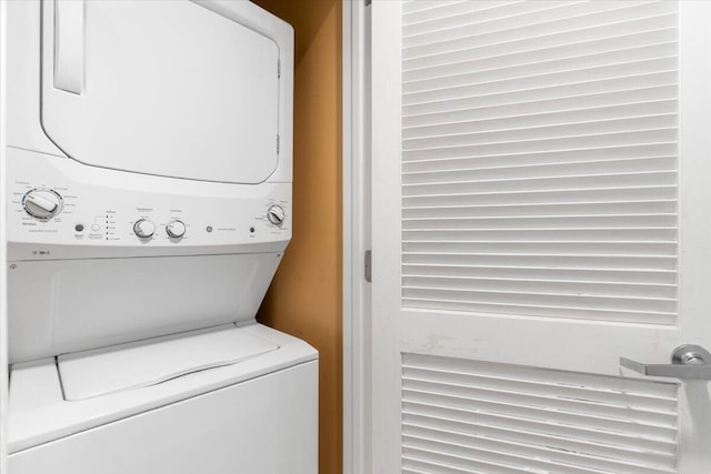 1515 SE Miracle Strip Pkwy Unit 305, Fort Walton Beach, FL 32548 - washroom featuring stacked washing machine and dryer
