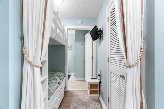 1515 SE Miracle Strip Pkwy Unit 305, Fort Walton Beach, FL 32548 - bathroom with a textured ceiling