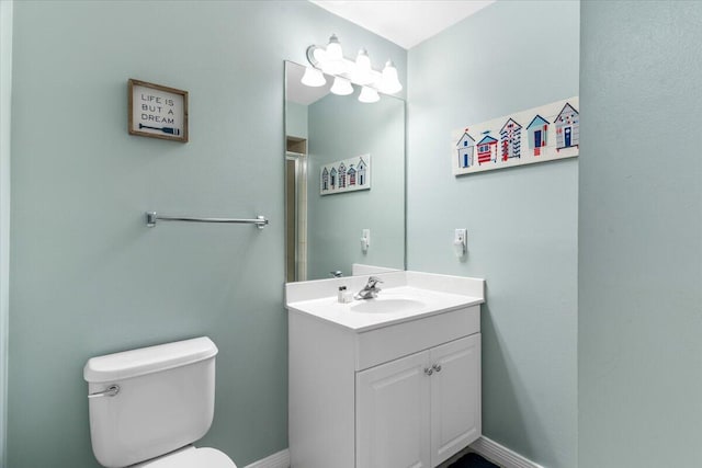 1515 SE Miracle Strip Pkwy Unit 305, Fort Walton Beach, FL 32548 - bathroom featuring vanity and a shower with door