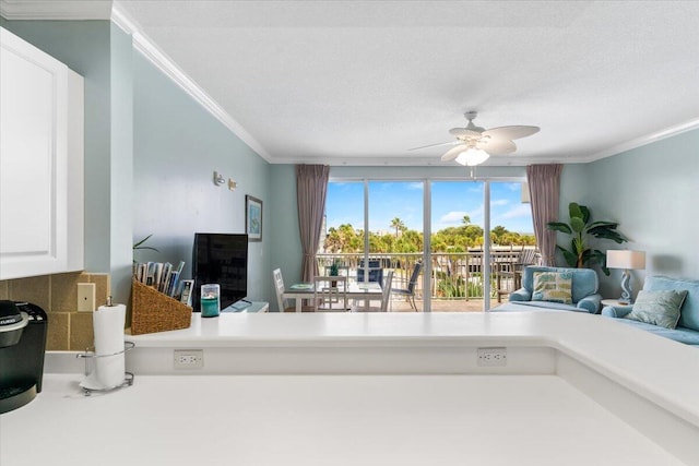 1515 SE Miracle Strip Pkwy Unit 305, Fort Walton Beach, FL 32548 - living area with crown molding and a ceiling fan