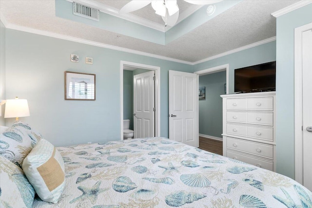 1515 SE Miracle Strip Pkwy Unit 305, Fort Walton Beach, FL 32548 - bedroom featuring ornamental molding and ensuite bathroom