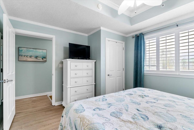 1515 SE Miracle Strip Pkwy Unit 305, Fort Walton Beach, FL 32548 - bedroom with light wood finished floors and crown molding