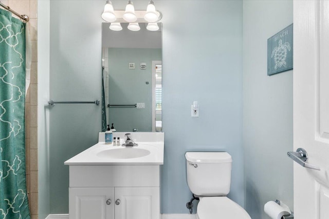 1515 SE Miracle Strip Pkwy Unit 305, Fort Walton Beach, FL 32548 - full bathroom with vanity and toilet