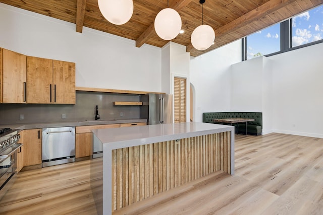 129 Oyster Lake Dr, Santa Rosa Beach, FL 32459 - kitchen featuring a wood ceiling with exposed beams, stainless steel appliances, light wood-type flooring, hanging light fixtures, and a center island