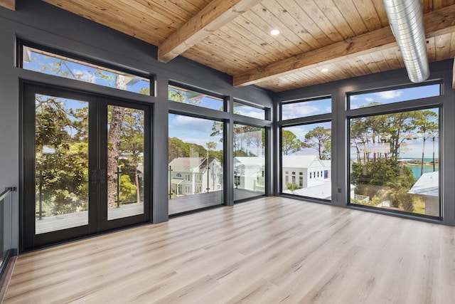 129 Oyster Lake Dr, Santa Rosa Beach, FL 32459 - unfurnished sunroom featuring beamed ceiling, healthy amount of natural light, and french doors