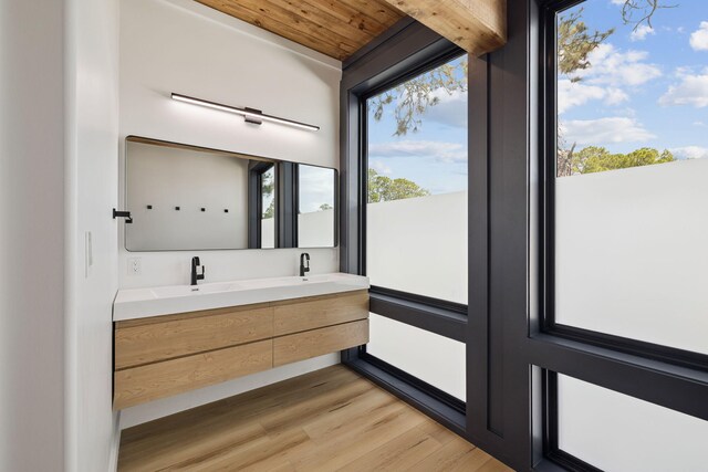129 Oyster Lake Dr, Santa Rosa Beach, FL 32459 - full bathroom with double vanity, wood finished floors, and wood ceiling