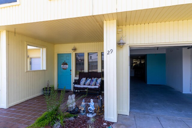 8520 Gulf Blvd Unit 29, Navarre, FL 32566 - view of exterior entry featuring a porch