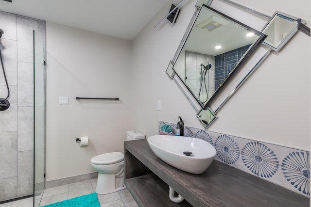 8520 Gulf Blvd Unit 29, Navarre, FL 32566 - bathroom featuring tiled shower, tile patterned flooring, and vanity