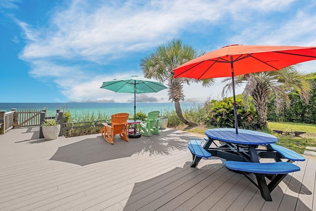 58 Montgomery St, Santa Rosa Beach, FL 32459 - wooden terrace featuring a water view and outdoor dining area