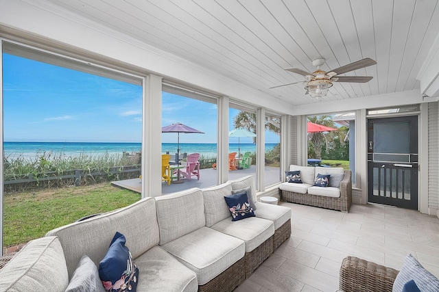 58 Montgomery St, Santa Rosa Beach, FL 32459 - sunroom / solarium with outdoor lounge area, a ceiling fan, and view of water and beach