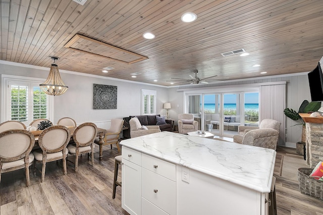 58 Montgomery St, Santa Rosa Beach, FL 32459 - kitchen with wooden ceiling, crown molding, plenty of natural light, open floor plan, and recessed lighting