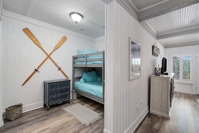 58 Montgomery St, Santa Rosa Beach, FL 32459 - bedroom with wood finished floors and wooden walls