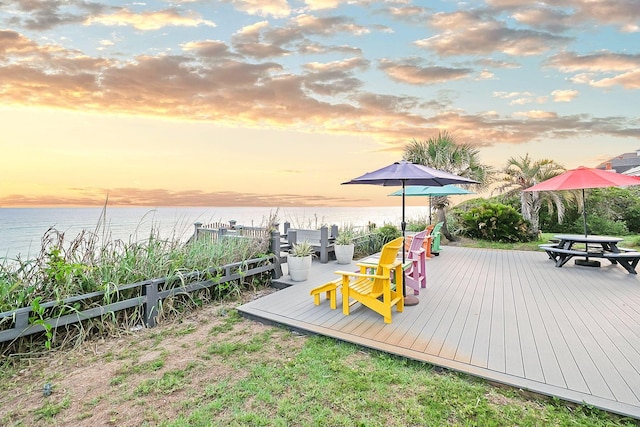 58 Montgomery St, Santa Rosa Beach, FL 32459 - deck at dusk with a water view and outdoor dining space