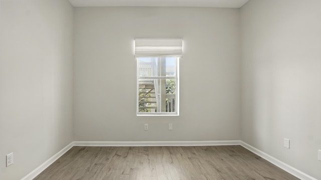 34 Herons Watch Way Unit 1202, Santa Rosa Beach, FL 32459 - unfurnished room featuring wood finished floors and baseboards