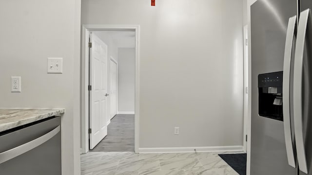 34 Herons Watch Way Unit 1202, Santa Rosa Beach, FL 32459 - kitchen with appliances with stainless steel finishes, light marble finish floors, and light countertops