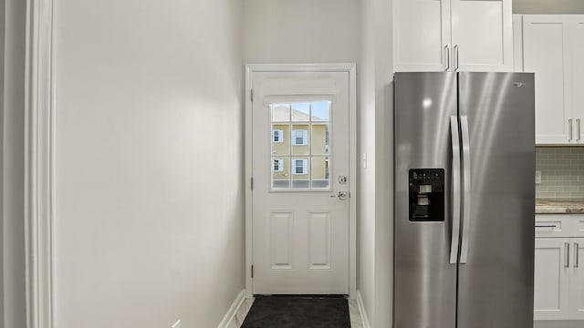 34 Herons Watch Way Unit 1202, Santa Rosa Beach, FL 32459 - doorway to outside featuring baseboards