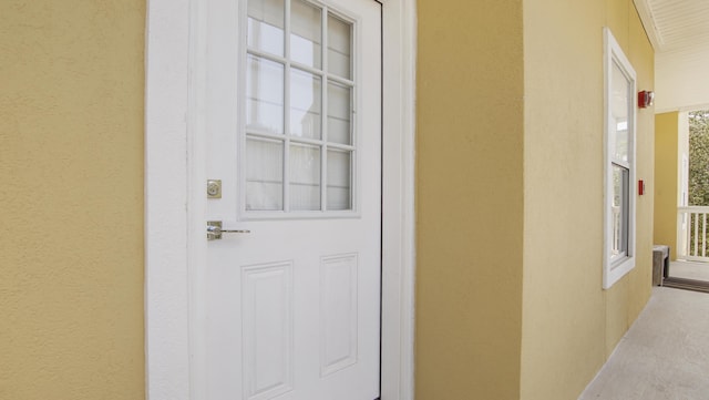34 Herons Watch Way Unit 1202, Santa Rosa Beach, FL 32459 - doorway to property with stucco siding