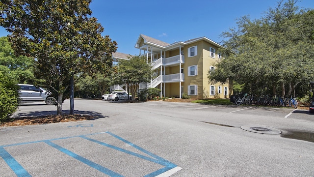 34 Herons Watch Way Unit 1202, Santa Rosa Beach, FL 32459 - view of property featuring uncovered parking