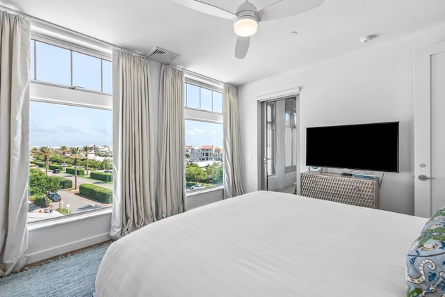 20 Mark Twain Ln Unit 402, Inlet Beach, FL 32461 - bedroom with ceiling fan and baseboards