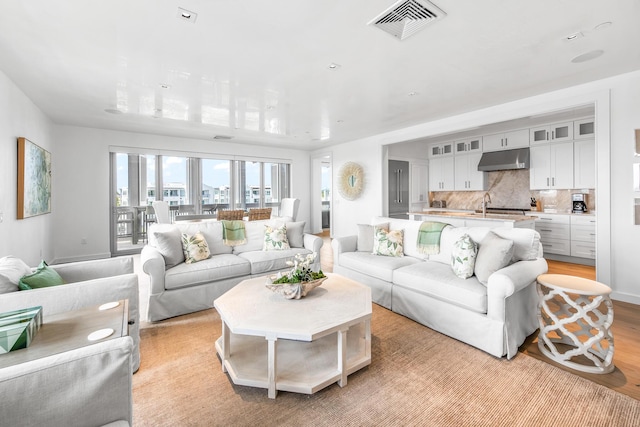 20 Mark Twain Ln Unit 402, Inlet Beach, FL 32461 - living room with light wood-type flooring